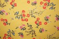 Tkanina wiskozowa - kwiaty na żółtym tle