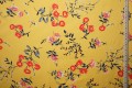 Tkanina wiskozowa - kwiaty na żółtym tle