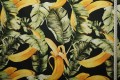 Tkanina ogrodowa wodoodporna - banany na czarnym tle