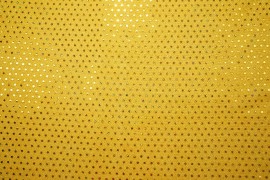 Tkanina dekoracyjna w żółte kropki