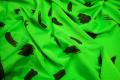 Lycra drukowana - czarne plamki na zielonym tle