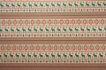 Tkanina świąteczna - zielone renifery na beżowym tle