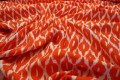 Tkanina wiskozowa w biało-pomarańczowy wzór