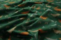 Bawełna perkal - wieloryby na zielonym tle