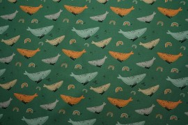 Bawełna perkal - wieloryby na zielonym tle