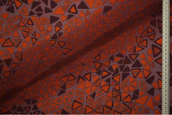 Tkanina sukienkowa w pomarańczowe trójkąty