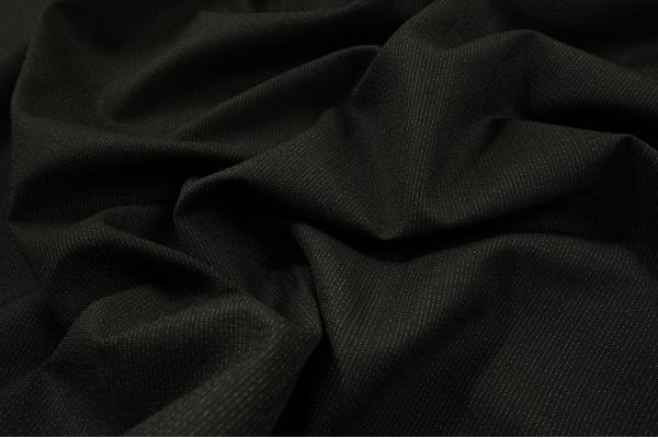 Tkanina wełniana z domieszką poliestru w kolorze czarnym z białym prążkiem