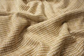 Tkanina wełniana w kolorze biało-beżowego melanżu ze złotą nitką