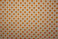 Bawełna - białe tło, pomarańczowe kropki 1 cm