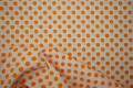 Bawełna - białe tło, pomarańczowe kropki 1 cm