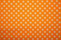 Bawełna - pomarańczowe tło, białe kropki 1 cm