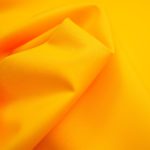 Tkanina ogrodowa - żółta - fale